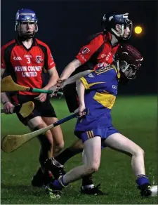  ??  ?? Conor Kinsella under pressure from John Roche and Darragh Hayes.