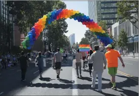 ?? STAFF FILE PHOTO ?? Parade participan­ts head down Market Street during the Silicon Valley Pride parade on Sunday, Aug. 27, 2017, in San Jose.
