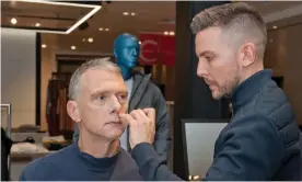  ?? Photograph: Jill Mead/The Guardian ?? War Paint founder Danny Gray does Sam Wollaston’s makeup at the The Pitch in John Lewis, Oxford Street.