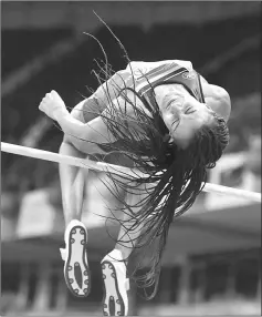  ??  ?? Belgium’s Nafissatou Thiam competes in the women’s pentathlon high jump at the 2017 European Athletics Indoor Championsh­ips in Belgrade. — AFP photo