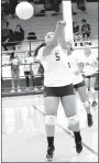  ?? Photo by Mike Eckels ?? Decatur’s Mathline Jesse returns the ball back into Lady Elks territory during the second set.