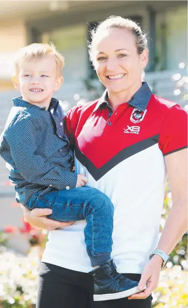  ?? Picture: TIM HUNTGER ?? BIG MOMENT: Womens Rugby League St George Illawarra Dragons player Kate Haren and her son Ollie. 3, in Wollongong yesterday,