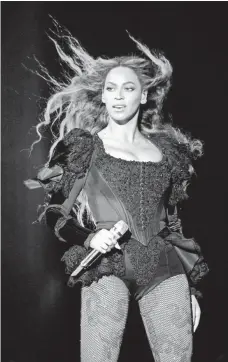  ?? KEVIN MAZUR, WIREIMAGE ?? Beyoncé performs during the Formation World Tour at the Georgia Dome Sunday in Atlanta.