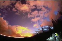  ?? PICTURE: REUTERS ?? ORANGE NIGHTSCAPE: A view of the lava spewing from ‘fissure 8’ on a slope of Hawaii’s Kilauea volcano at sunset.