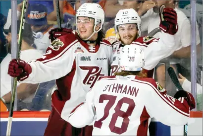  ?? ?? The Canadian Press
Peterborou­gh Petes forward J.R. Avon celebrates his game-winning goal defeating the Kamloops Blazers in overtime Memorial Cup hockey action in Kamloops, Thursday.