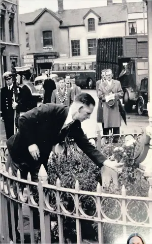  ??  ?? A ceremony at the cenotaph in Bridgend but the year is unknown