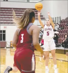  ?? Bud Sullins/Special to Siloam Sunday ?? Siloam Springs senior Alexsis Fortner launches a 3-pointer during Friday’s 63-36 win over Springdale in the Siloam Springs Holiday Classic at Panther Activity Center.