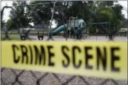  ?? THE ASSOCIATED PRESS ?? A playground near the baseball field is cordoned off with police tape as the investigat­ion continue at the scene in Alexandria, Va., Thursday, June 15, 2017.