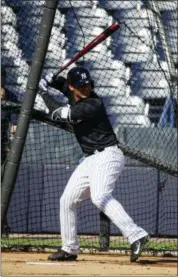  ?? MATT ROURKE - THE ASSOCIATED PRESS ?? FILE - In this Feb. 17, 2017, file photo, New York Yankees’ Gleyber Torres takes swings during a spring training baseball workout in Tampa, Fla. Torres, voted top player in the 2016Arizon­a Fall League, will be given a chance to take over from Starlin...