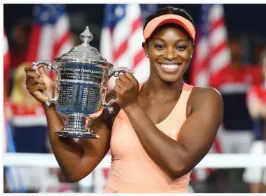  ??  ?? Sloane Stephens of the US celebrates with her winning trophy after defeating compatriot Madison Keys in their 2017 US Open women's singles final match at the USTA Billie Jean King National Tennis Center in New York on Saturday. (AFP)