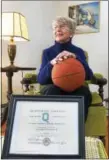  ?? PETER HVIZDAK — NEW HAVEN REGISTER ?? Barbara Lupino Mecca, 83, of Hamden, sits with a certificat­e recognizin­g her as receiving a Quinnipiac College varsity letter for the schools’ first women’s basketball team coached by New Haven coaching legend Salvatore “Red” Verderame during the...