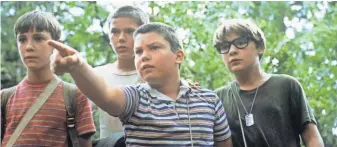  ?? UNIVERSAL FILMS VIA AP ?? Friends Gordie ( Wil Weaton, left), Chris ( River Phoenix), Vern ( Jerry O’Connell) and Teddy ( Corey Feldman) are on a quest to find the body of a missing boy near their town in 1959.