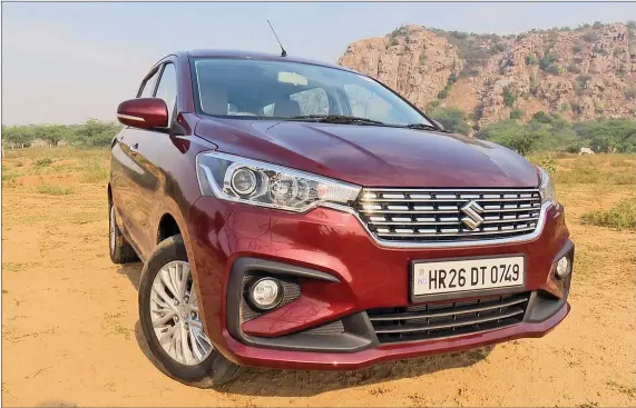  ??  ?? The new Maruti Suzuki Ertiga gets a chrome-studded grille along with projector headlamps which stand out on the front.