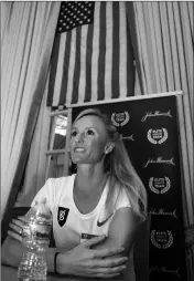 ?? ASSOCIATED PRESS ?? ELITE U.S. RUNNER SHALANE FLANAGAN speaks to reporters Friday in Boston. The 122nd running of the Boston Marathon is scheduled for Monday.