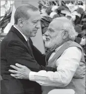  ??  ?? Prime Minister Narendra Modi greets Turkish President Recep Tayyip Erdogan in New Delhi on Monday.