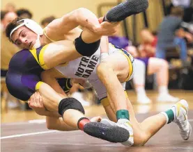  ?? RICK KINTZEL/THE MORNING CALL ?? Notre Dame-Green Pond junior Andrew Cerniglia, right, will use his experience to prepare for another run at the PIAA wrestling championsh­ips.