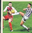  ??  ?? HARSH A penalty was awarded for this handball by Calum Chambers