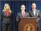  ?? BETH BURGER / DISPATCH ?? U.S. Attorney Benjamin Glassman (center) announces the charges at a news conference Thursday.
