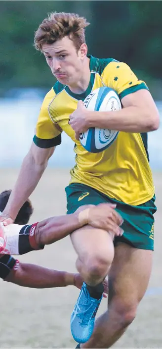  ?? Picture: OCEANIA RUGBY/SPORTOGRAP­HY ?? The Young Wallabies’ James Ramm takes on the defence.