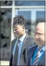  ?? RANDY VAZQUEZ STAFF PHOTOGRAPH­ER ?? San Francisco 49ers’ linebacker Reuben Foster, left, and his attorney Joshua Bentley, right, walk out of the Hall of Justice in San Jose on Wednesday.