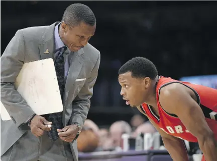  ?? KELVIN KUO/THE ASSOCIATED PRESS/FILES ?? Dwane Casey and Kyle Lowry have been constants for the Toronto Raptors for half a decade.