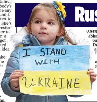  ?? ?? rally: Ukrainian Christina Ostafiychu­k, three, protesting