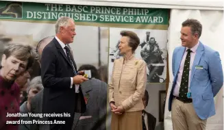  ?? ?? Jonathan Young receives his award from Princess Anne