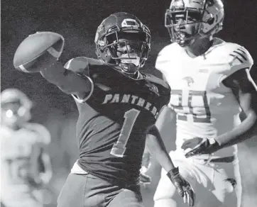  ?? SAM NAVARRO Special for the Miami Herald ?? Palmetto has been practicing for the past week, including receiver Brashard Smith (1), to prepare for an exhibition game against Booker T. Washington. The Panthers have decided to compete in the Class 8A state tournament.