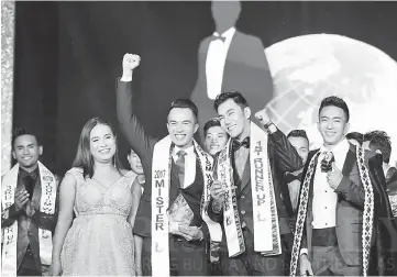  ??  ?? (From third left) Joshua Lennet celebrates his win with Aung Seng and Mister Tourism World 2016 winner Okkar Min Maung. At second left is owner of Mister Tourism World Organisati­on Precious Anne Medina.