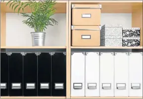  ??  ?? NEAT TOUCH: Using cupboards to store your boxes makes loads of sense