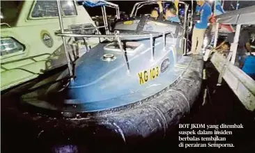  ??  ?? BOT JKDM yang ditembak suspek dalam insiden berbalas tembakan di perairan Semporna.