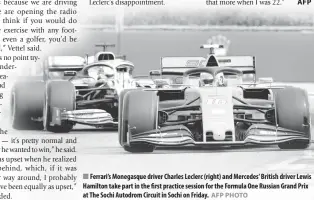  ?? AFP PHOTO AFP ?? Ferrari’s Monegasque driver Charles Leclerc (right) and Mercedes’ British driver Lewis Hamilton take part in the first practice session for the Formula One Russian Grand Prix at The Sochi Autodrom Circuit in Sochi on Friday.