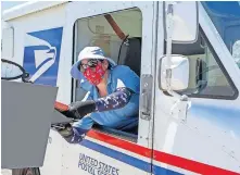  ?? [USA TODAY FILE PHOTO] ?? In this April 15 photo, United States Postal Service mail carrier Sherry Shotwell delivers mail in Palm Springs, Calif.