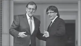  ??  ?? De Spaanse premier Mariano Rajoy (links) en de Catalaanse regionale premier Carles Puigdemont. (Foto: EPA)