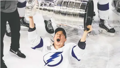  ?? JASON FRANSON/ THE CANADIAN PRESS ?? The Tampa Bay Lightning defeated the Dallas Stars for the Stanley Cup in a year in which the NHL and owners spent millions to conclude a season filled with COVID-19 risks.