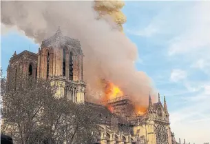  ?? VANESSA PENA THE ASSOCIATED PRESS ?? France's iconic Notre Dame cathedral was engulfed in a major fire on April 15. While the spire and the roof collapsed, firefighte­rs managed to salvage the main structure and its two bell towers.