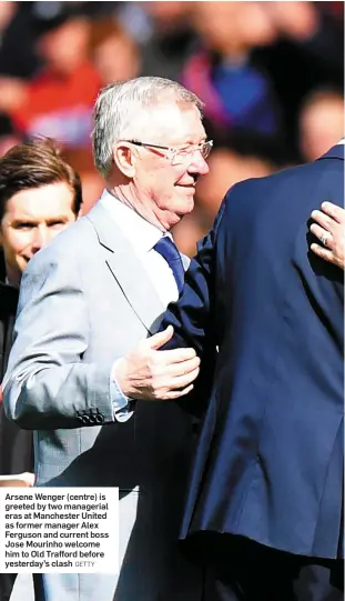  ??  ?? Arsene Wenger (centre) is greeted by two managerial eras at Manchester United as former manager Alex Ferguson and current boss Jose Mourinho welcome him to Old Trafford before yesterday’s clash