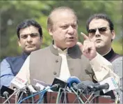  ?? Photograph­s by T. Mughal European Pressphoto Agency ?? PAKISTANIP­rime Minister Nawaz Sharif could be tried on charges of corruption and money laundering. He dismisses the investigat­ion as a “piece of trash.”