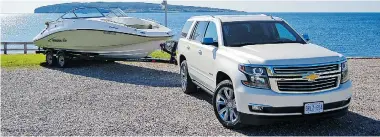  ?? DEREK MCNAUGHTON/Driving ?? The 2015 Chevrolet Tahoe had no problems towing a 5,200-pound boat and trailer in Quebec’s hilly Gaspé region.