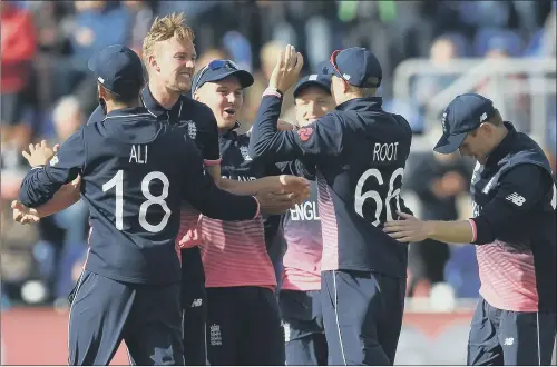  ?? PICTURE: JOE GIDDENS/PA ?? VICTORY SALUTE: England’s Jake Ball celebrates the wicket of New Zealand’s Ross Taylor during their ICC Champions Trophy match in Cardiff.