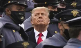  ?? Photograph: Andrew Harnik/AP ?? Surrounded by Army cadets, Donald Trump watches the first half of the 121st Army-Navy Football Game at West Point earlier this month.