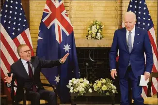  ?? Evan Vucci / Associated Press ?? President Joe Biden, right, jokes with Australian Prime Minister Anthony Albanese during the Quad leaders summit meeting at Kantei Palace on Tuesday.