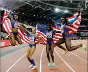  ?? ASSOCIATED PRESS ?? From left, United States’ Aaliyah Brown, Allyson Felix, Tori Bowie and Morolake Akinosun celebrate after winning the gold medal in the women’s 4x100-meter final during the World Athletics Championsh­ips in London on Saturday.