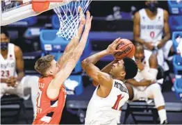  ?? AJ MAST AP ?? San Diego State forward Matt Mitchell tries to shoot over Syracuse forward Marek Dolezaj during the second half Friday night in the NCAA tourney.