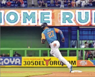  ?? ERIC ESPADA / GETTY IMAGES ?? Miami’s Giancarlo Stanton, circling the bases with his 50th home run, has a chance to surpass the 61-home run season mark that stood for decades — until it was eclipsed during what is now called the Steroid Era.