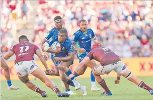  ?? Picture: STU ALLEN ?? Fijian Drua inside centre Apisalome Vota bursts his way against the Queensland Reds in the Super Rugby clash at the Suncorp Stadium in Brisbane, Australia on Sunday. The Reds won 27-24.