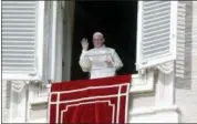  ?? GREGORIO BORGIA — THE ASSOCIATED PRESS ?? Pope Francis waves to faithful at the end of the Angelus prayer he delivered in St. Peter’s Square at the Vatican, Sunday.