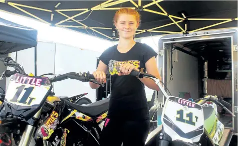  ?? BERND FRANKE/POSTMEDIA NEWS ?? Taia Little, 13, of Welland is leading the 85 cc and 250 Novice divisions in points in her first full season racing motorcycle­s at Welland County Speedway.