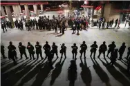  ?? Scott Olson, Getty Images ?? Demonstrat­ors protest the killings of 18-year-olds Michael Brown by a Ferguson, Mo., police officer and Vonder Myers Jr. by an off-duty St. Louis police officer in October 2014.