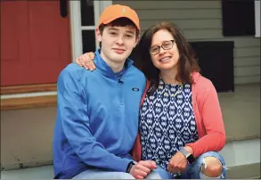  ?? Erik Trautmann / Hearst Connecticu­t Media ?? Luke Schwartz, 16, and his mother, Deborah List, at their home Thursday in Wilton.